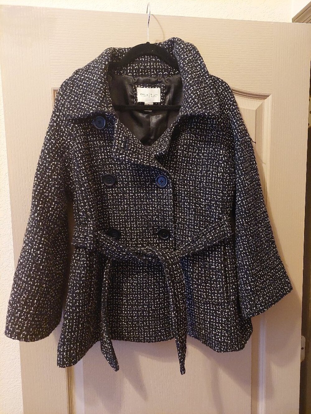 Black-and-white textured tweed double-breasted belted jacket